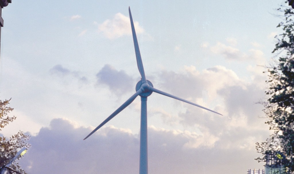 The WindShare wind turbine, located in Toronto on a summer evening. Image of top of the turbine while it isn't moving.